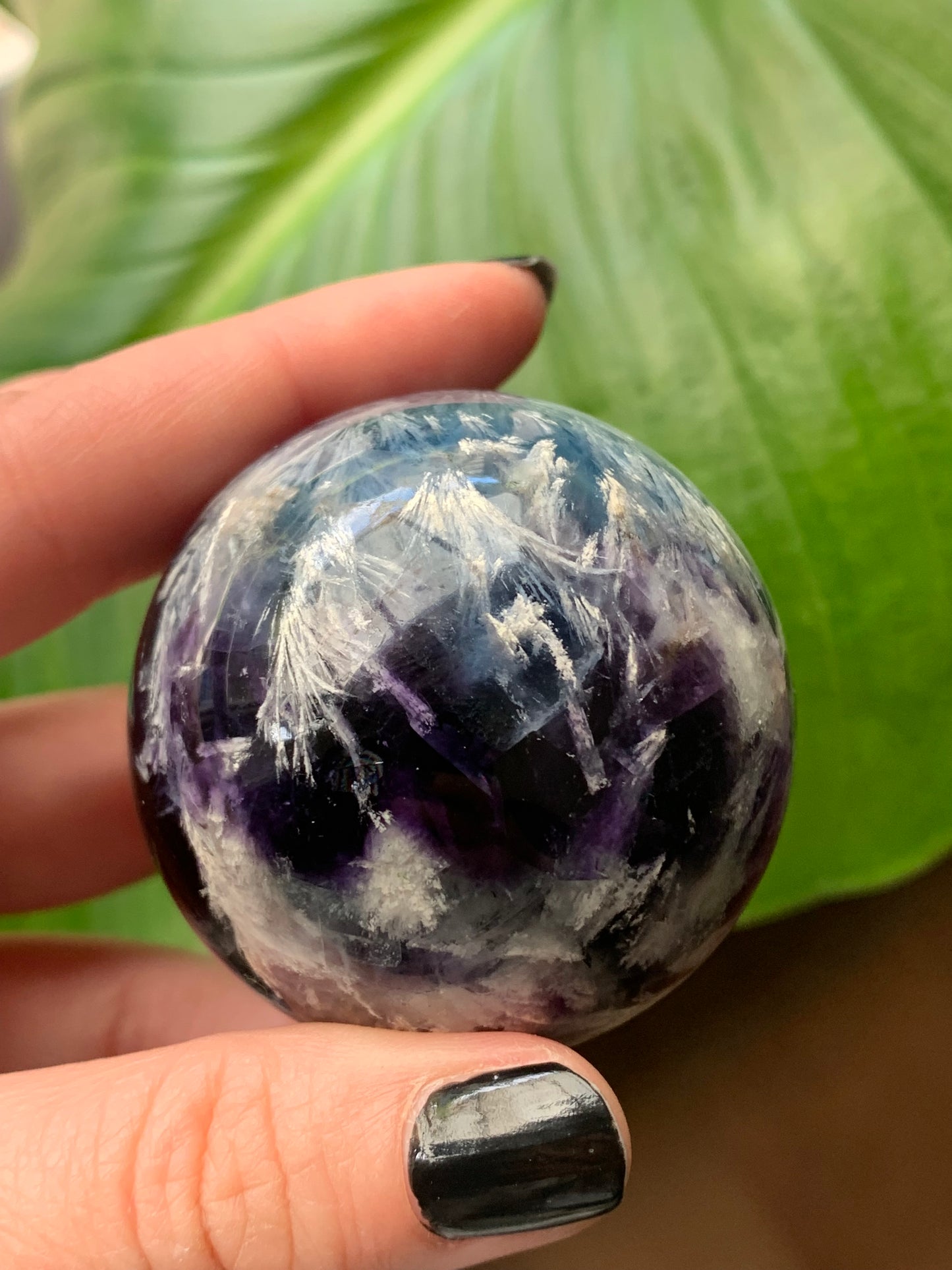 Fluorite snow sphere / feather