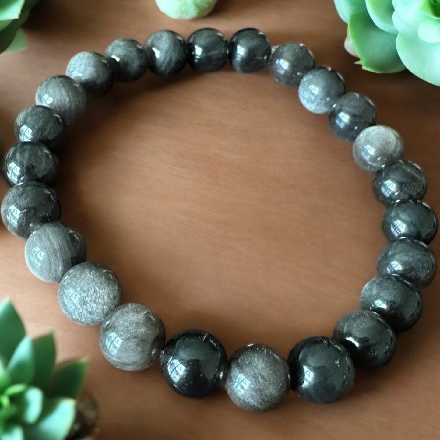 Pulsera de obsidiana plateada